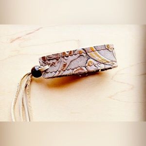 Cream genuine leather cuff with adjustable Bead